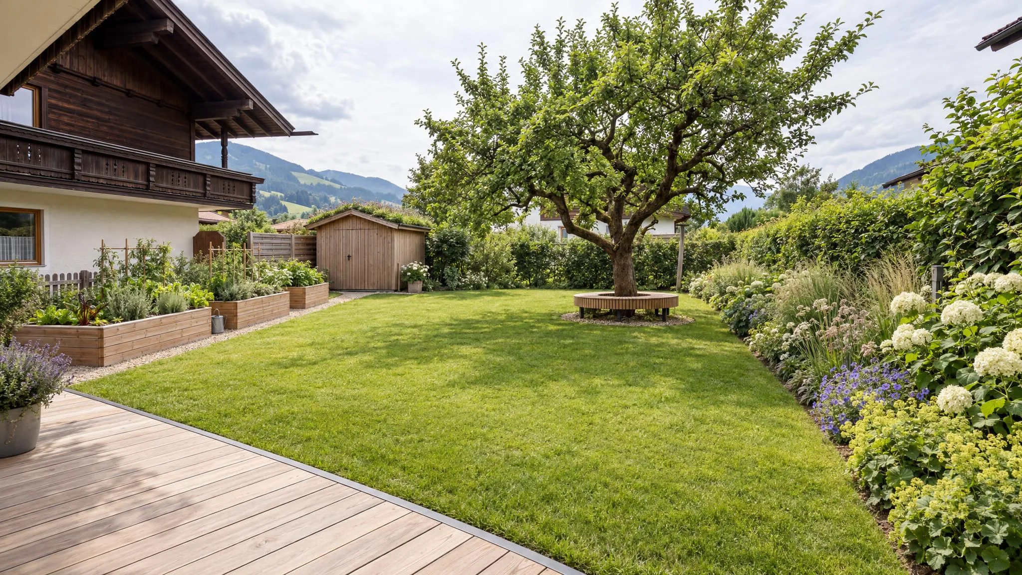 The same garden as a family garden with a larch deck, open lawn, a circular bench around the apple tree, raised beds along the fence and a perennial border in front of a hornbeam hedge